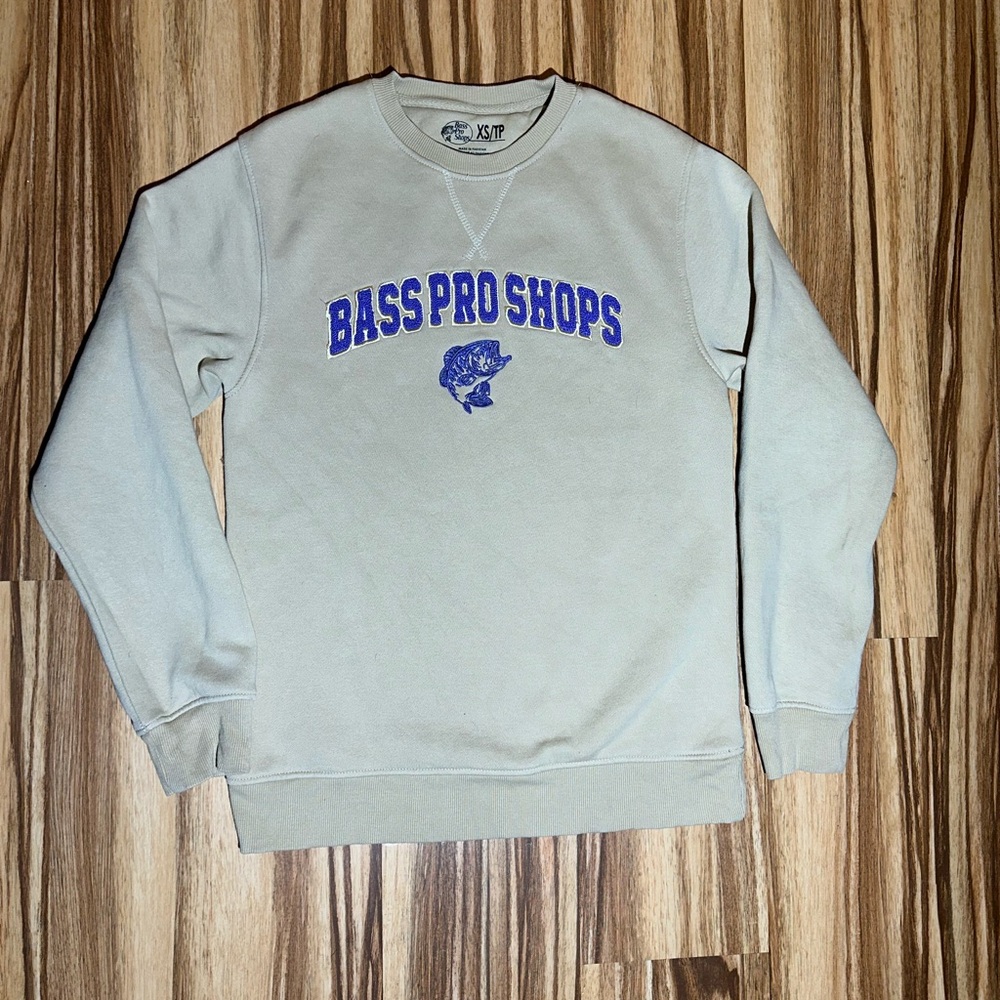 Bass Pro Shops Tan with Purple lettering Sweater